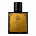 Gold and black Flora Eau de Parfum bottle on a white background